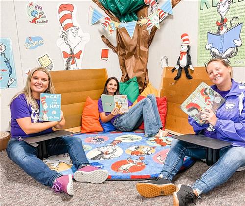 3 teachers reading in the book nool